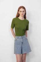 green T-shirt