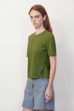 green T-shirt