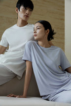 man in white T-Shirt and woman in blue T-Shirt