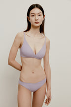 woman in light purple bra and brief