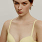 Woman wearing yellow bra
