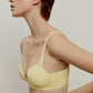 Woman wearing yellow bra