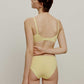 woman in yellow bra and brief
