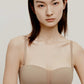 woman in tan color bra 