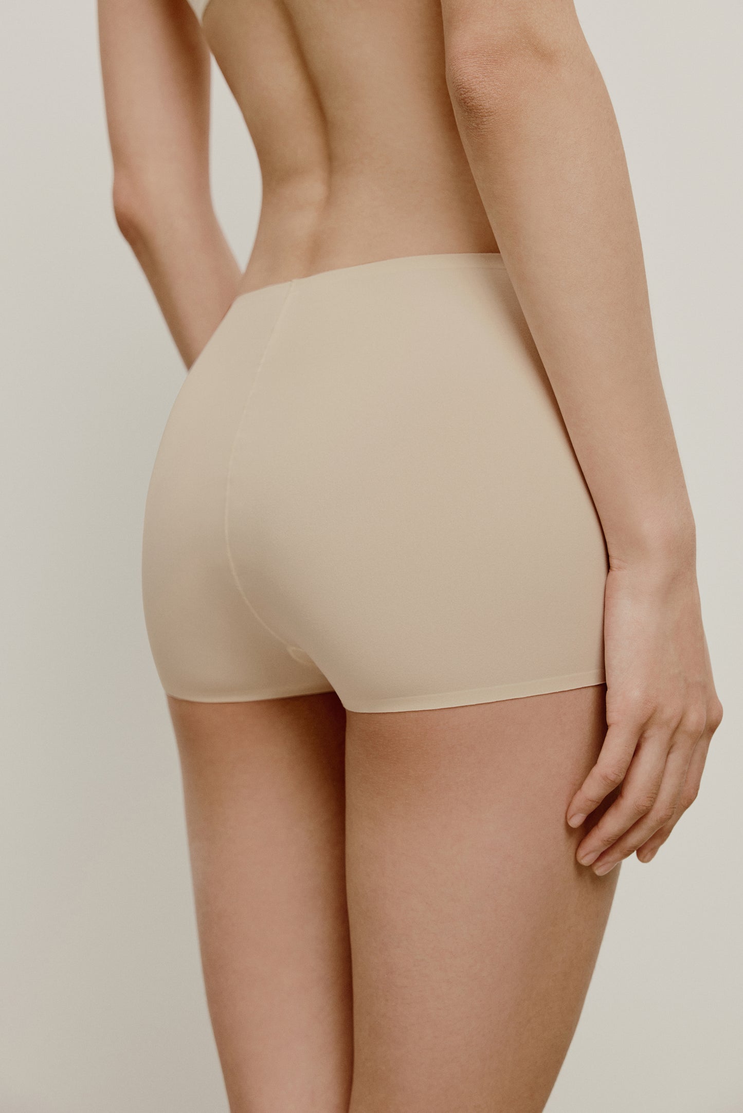 back of the nude boy shorts