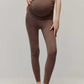 pregnant woman in high waist brown leggings
