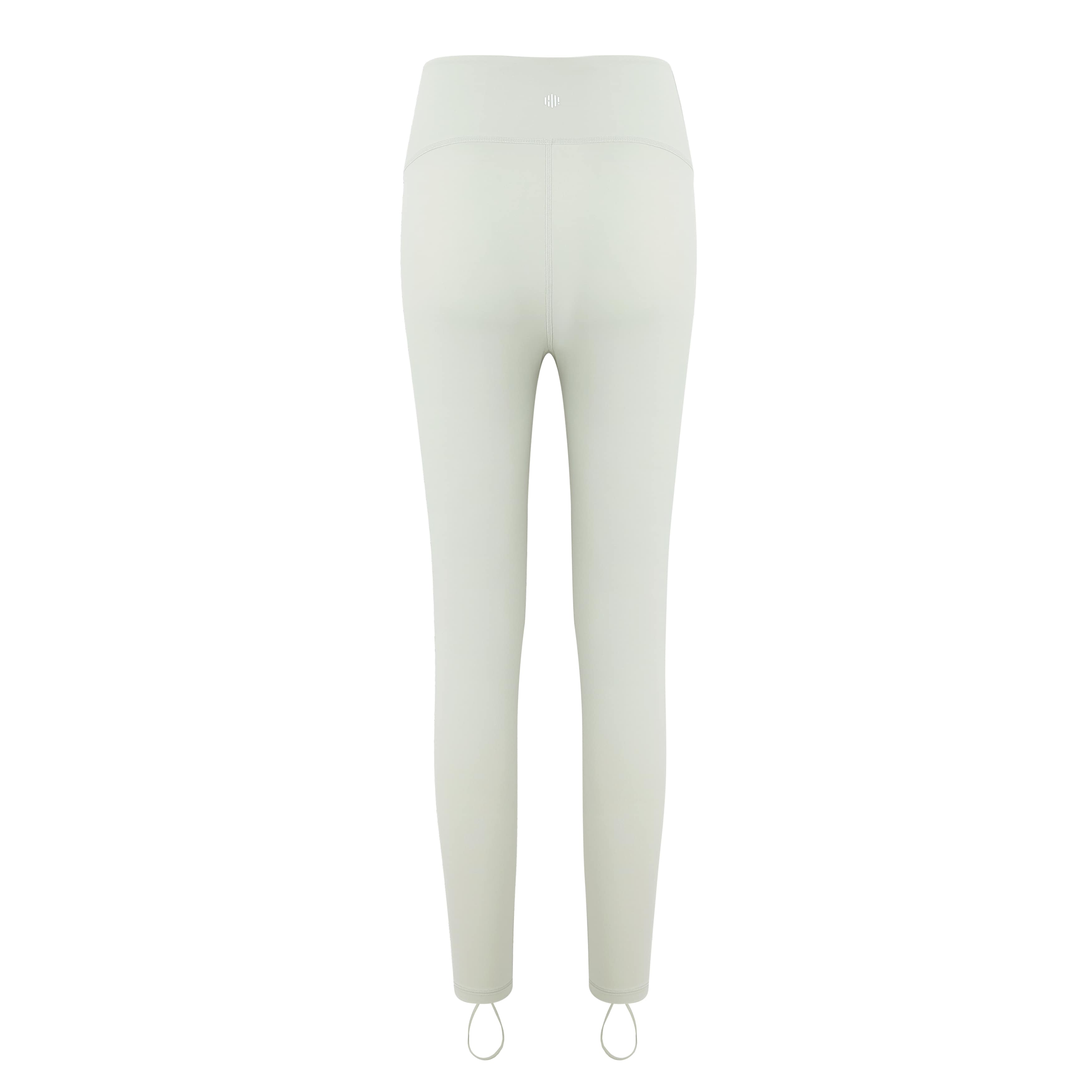 flat lay image of cream leggings from back