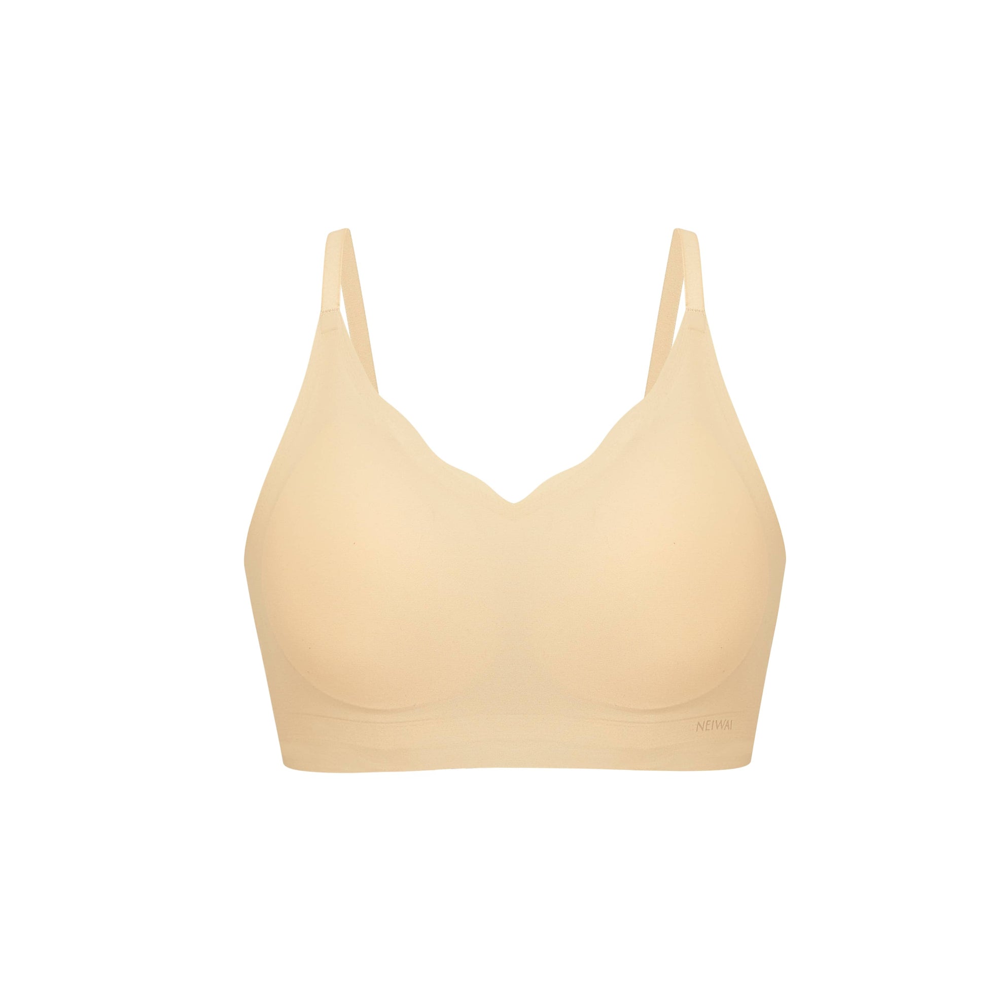 Flat lay image of beige bra