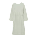 flay lay image of the long sleeve mint pajama dress with waist drawstring from back