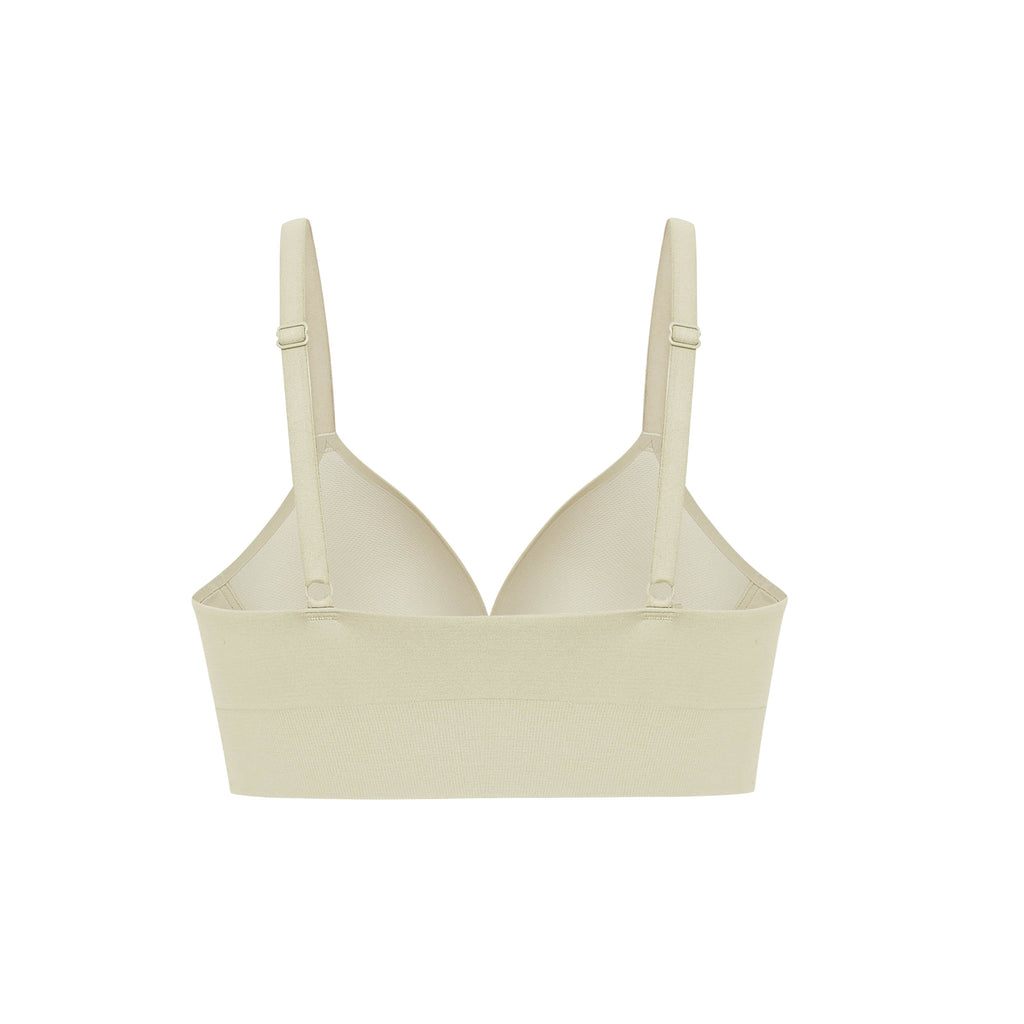 the back of a cream bra