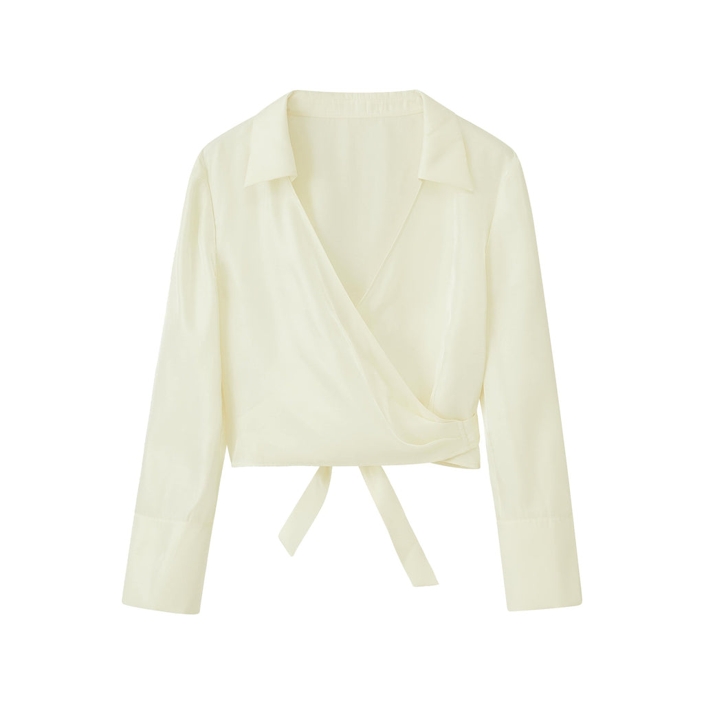 flat lay image of white satin shirt