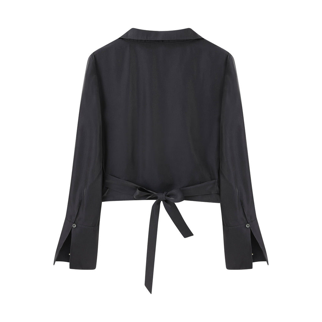 flat lay image of navy satin shirt from back