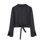 flat lay image of navy satin shirt from back
