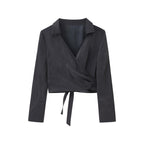 flat lay image of navy satin shirt