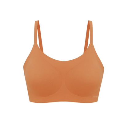 Flat lay of spaghetti strap bra in light orange