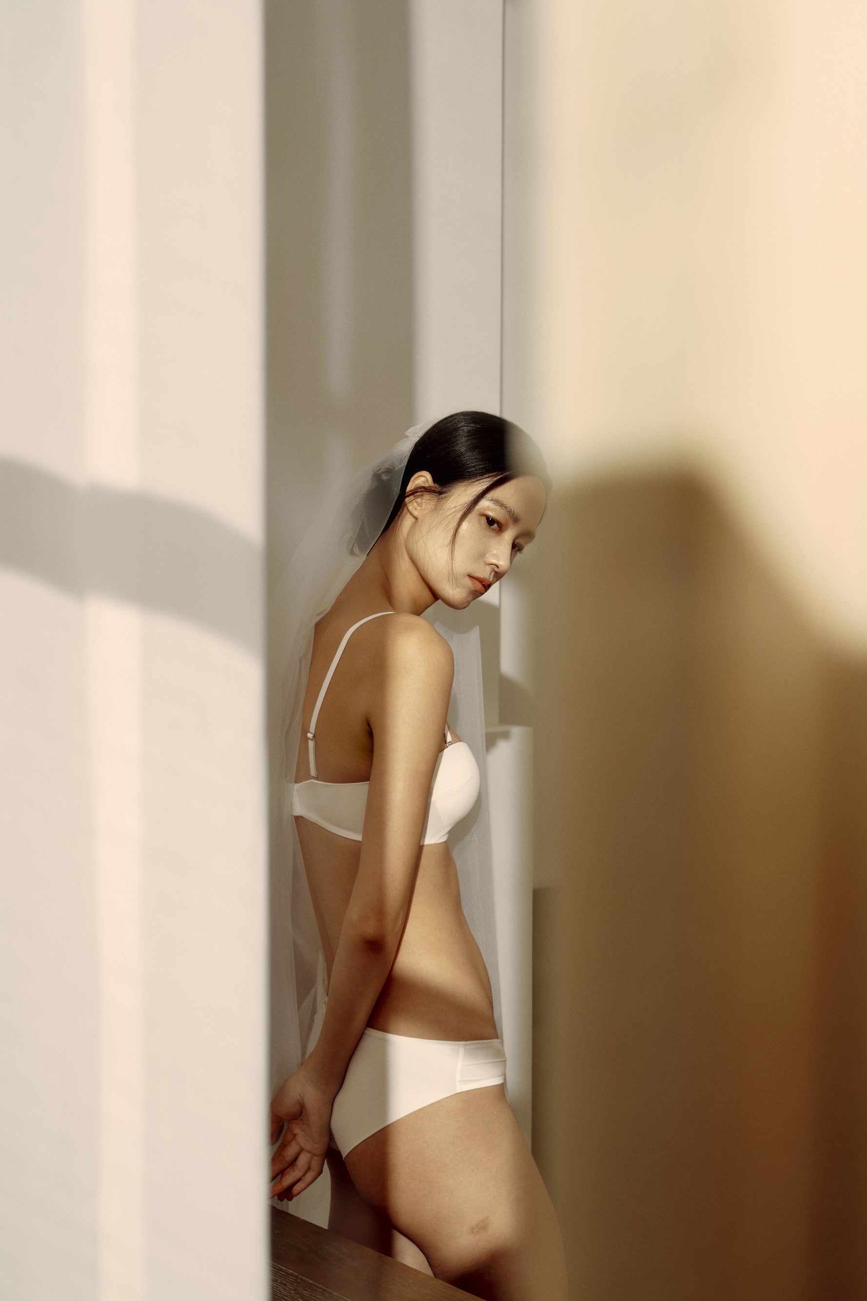 woman in white bra and underwear