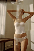 woman in white corset and underwear